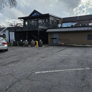 a parking lot in front of a restaurant
