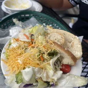 Side salad that was ordered with the fried cod fish sandwich