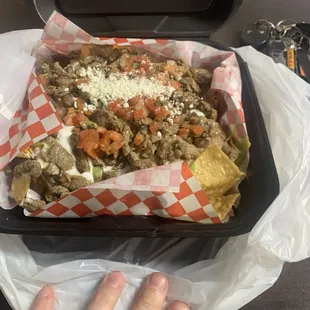 Super Nachos with carne asada