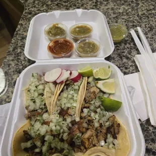 Steak, chicken,  and pastor tacos.