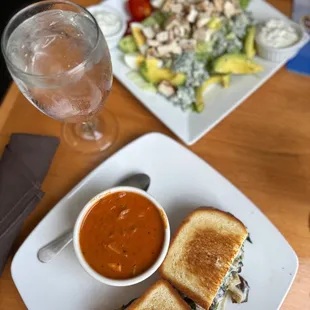 Garden press sandwich, tomato artichoke soup, Cobb salad