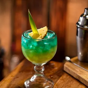 Island Tiki: Captain Morgan, Malibu rums, tropical mango purée, pineapple juice, sweet &amp; sour and blue curaço.