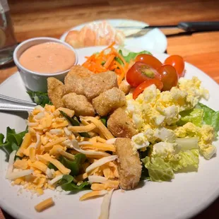 The best dinner salad! Ice cold and crispy and has the best toppings.