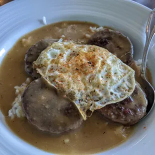 Vegetarian loco moco with veggie patties and veggie gravy