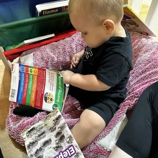 Book shelf with bean bag chair to sit &amp; read.