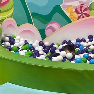 My son in the ball pit