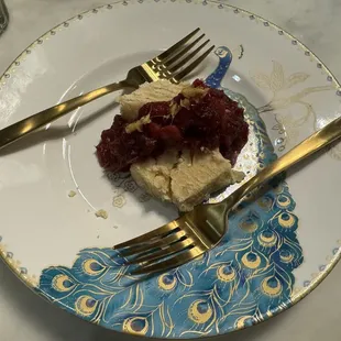 a piece of cake on a plate with a fork