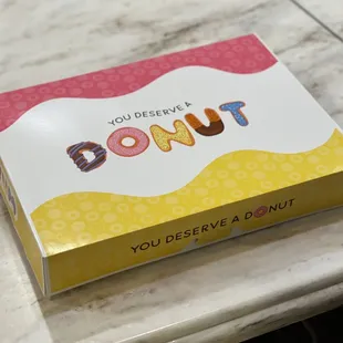 a donut box on a table