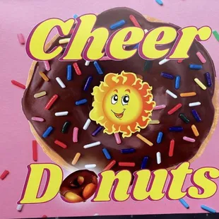 a chocolate frosted donut with sprinkles