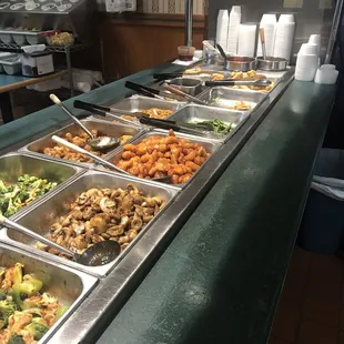 a buffet with many different types of food