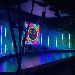 a smiley face on a stage