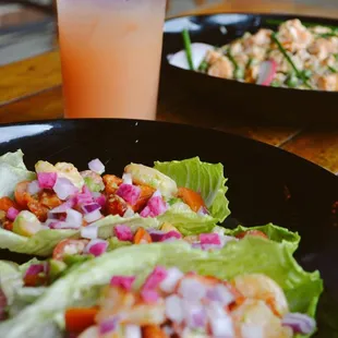 two plates of food and a drink