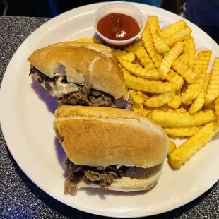 Philly cheesesteak &amp; fries...
