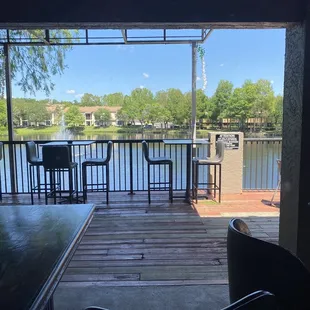a view of a lake from a deck