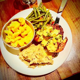 Steak &amp; grilled shrimp with their special hollandaise sauce, mashers, Mac &amp; Cheese &amp; green beans, this is a split portion even!