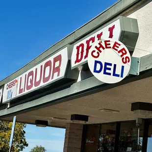 the outside of a deli and liquor store