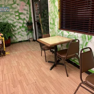 a table and chairs in a restaurant