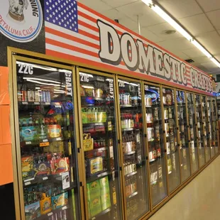 a row of refrigerators in a store