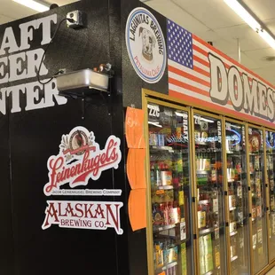 a row of beer coolers