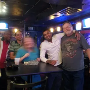 a group of people posing for a picture