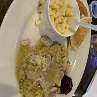 Chicken and dressing with Mac n Cheese and cornbread