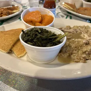 Dressing with chicken and gravy, greens, yams, catfish, spaghetti