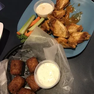 Cheesy Bacon tots and Wings ($11)