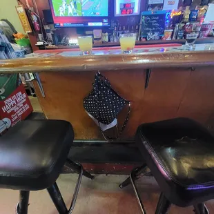 two stools and a television