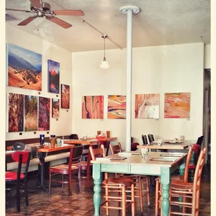 The seating area on the left, cozy with some great artwork.