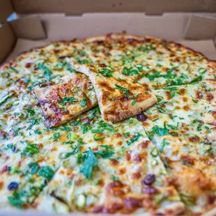Artichoke, spinach, fresh ricotta, mozzarella, garlic olive oil, organic lemon zest, and Italian parsley