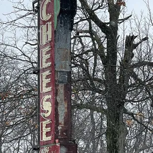 a sign for a cheese shop