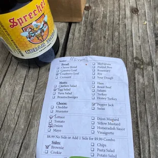 a list of ingredients and a bottle of beer