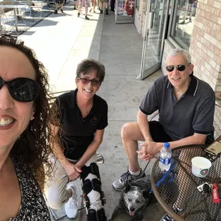 The manager of Cheese Cake Heaven posed with us after giving our dog a frozen yogurt dog treat!