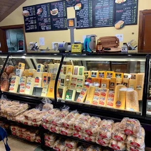 a display of cheeses and pastries