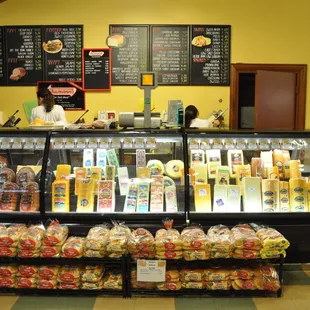 a display of cheeses and pastries