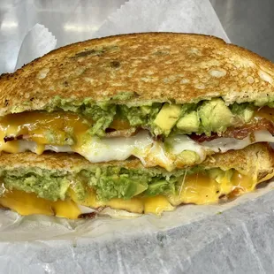 The Green, fresh mashed avocado, bacon, cheddar and mozzarella cheese.
