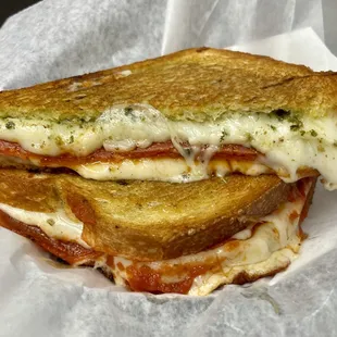 Jersey Shore basil pesto, marinara, pepperoni and mozzarella cheese