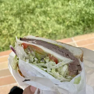 Roast Beef delux with everything, Dutch bread, provolone cheese