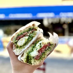 Burrata Rocket - Arugula Pesto, Burrata Mozzarella, Black Pepper, Tomato, and Focaccia Bread