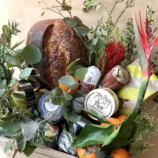 Medium Gift Basket with Cheese, Salami, Nuts, Fresh Fruits, Dried Fruits, Bub &amp; Grandma's Bread, Crackers, Jam and Flowers