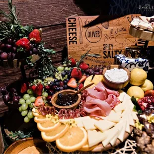 a variety of cheeses and fruits