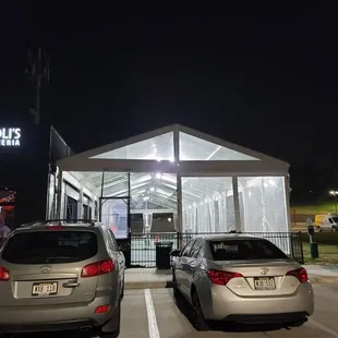 two cars parked in a parking lot