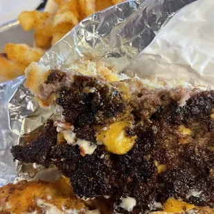 Disgusting burnt burger.