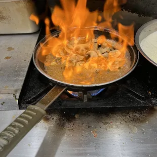 a skillet on fire