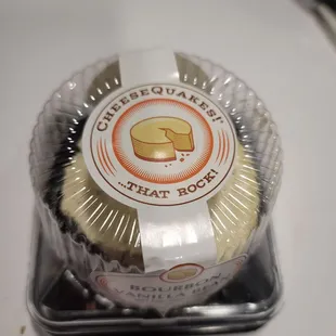 a cupcake in a plastic container