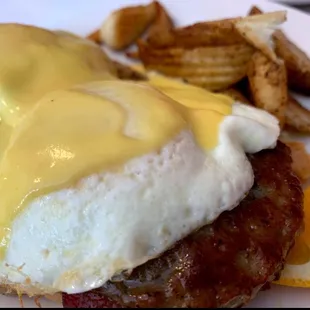 Eggs Benedict over sausage