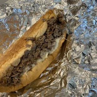 a sandwich wrapped in foil