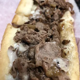 Up close pic of the Philly cheesesteak. The grilled onions tasted pickled.