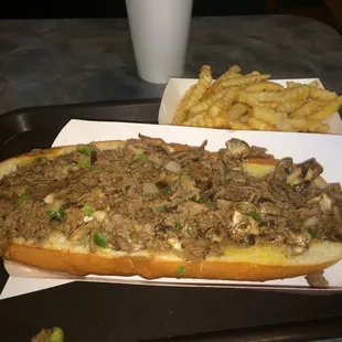10" Cheesesteak with peppers, onions and mushrooms and side of krinkle cut fries.