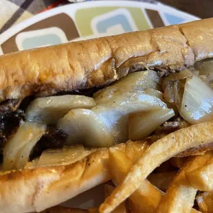 a plate of fries and a sandwich